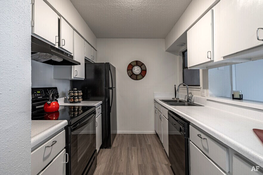 Apartment Amenities - Kitchen, Living, and Dining Rooms